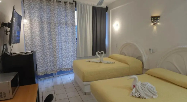 Lovely studio apartment with balcony AC & wi-fi, minutes from downtown!, Забронировать Апартаменты/квартира Сиуатанехо Ixtapa-Zihuatanejo