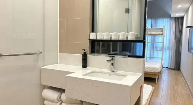 Кровать в общем номере Miyuan Prince Hotel