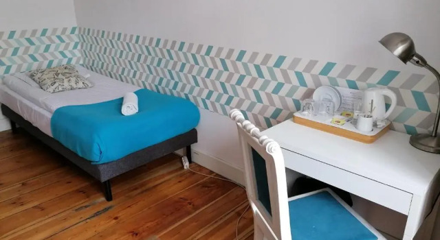 Номер Deluxe Blooms Inn & Apartments