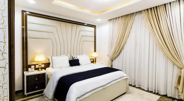 Номер Deluxe Yellow Trumpet Residence Asokoro
