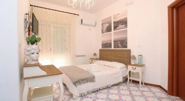 Четырёхместный номер Standard с балконом B&B Villa Maiolica
