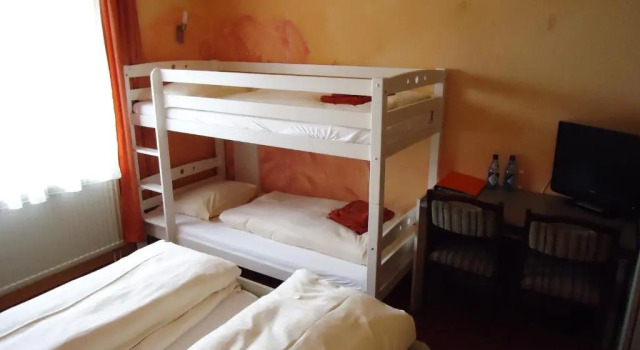 Четырёхместный номер Standard Hotel Krone