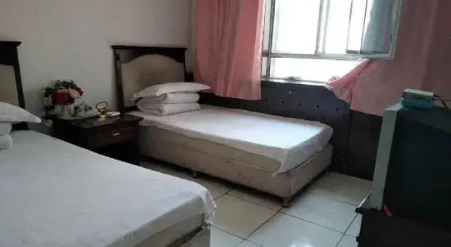 Номер Economy Urumqi Meiyuan Hotel