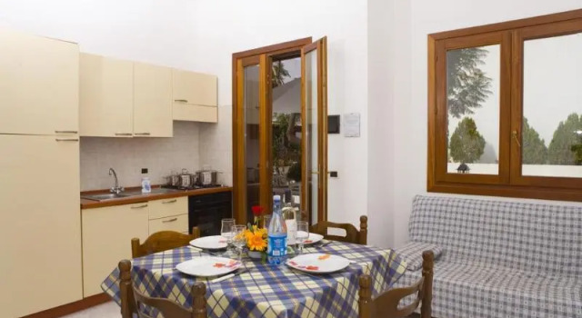Кровать в общем номере Residence Smeraldo