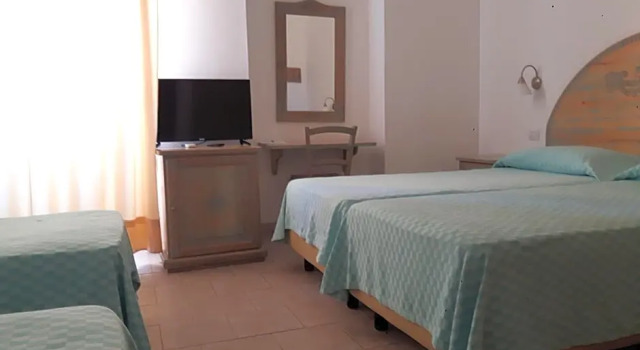 Четырёхместный номер Alghero Vacanze Hotel
