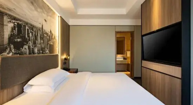 Люкс Business Qing Teng Yi Su Hotel (Ningbo Beilun Ning Vocational College Store)