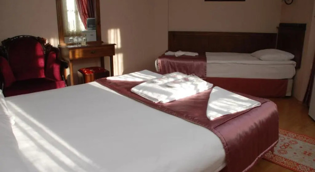 Трёхместный номер Standard Tashkonak Studio Suites