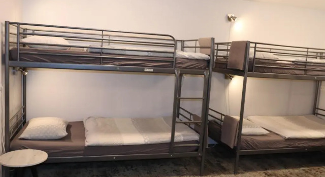 Кровать в общем номере Höfn Hostel