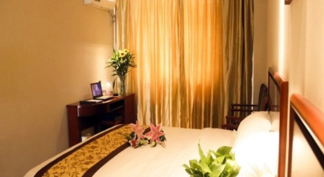 Greentree Inn Yantai University Business Hotel, Забронировать Отель Лайшань 