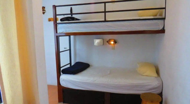 Кровать в общем номере La Catrina Hostel