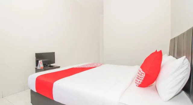 Двухместный номер Standard с балконом OYO 2984 Berlian House Ungasan