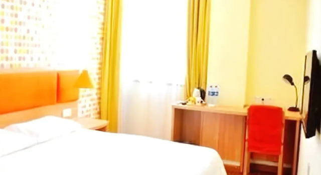 Home Inn Yangquan Peach West Street to the North is the International new City Shop, Buchen Sie Hotel Yangquan Shanxi