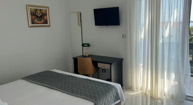 Двухместный номер Deluxe с балконом и с частичным видом на море VILLA JANE INN