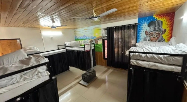Кровать в общем номере Star Vibes Resort