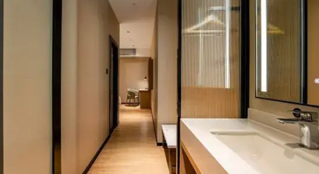 Семейный люкс Xinyi Hotel (DongGuanLiaobuwanrunguangchang)