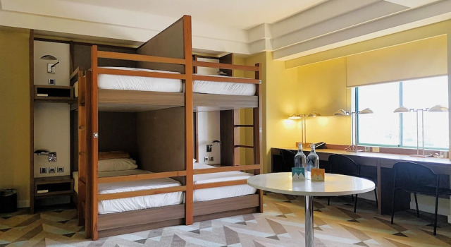 Кровать в общем номере Hotel Benilde Maison De La Salle