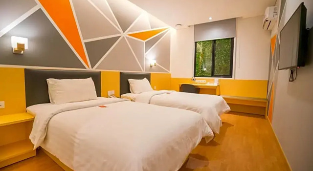 Номер Deluxe Juno Jatinegara Jakarta