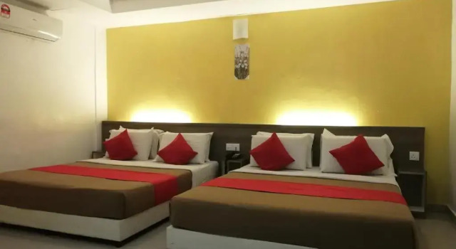 Четырёхместный номер Deluxe Yellow Mansion Hotel Melaka Raya