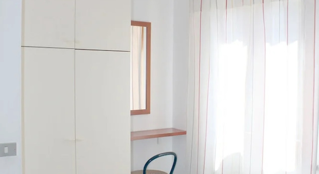 2 soveværelser i familie lejlighed med altan med havudsigt Casa Roberta