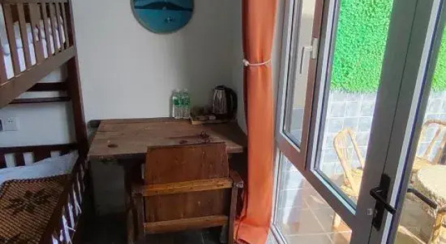 Кровать в общем номере Xingcheng Old Town Guesthouse