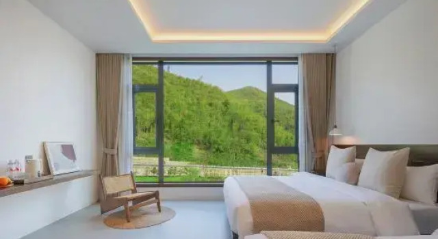 Кровать в общем номере Moganshan · Sanye Villa: A Family-Friendly Retreat Surrounded by Mountains