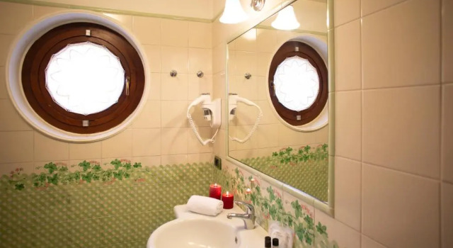 Четырёхместный номер с видом на сад Hotel Ristorante Piccolo Chianti