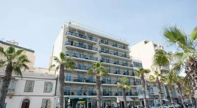 Кровать в общем номере Bayview Hotel by ST Hotels
