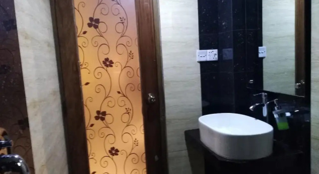 Grande quarto Bottomhill Palace Hotel