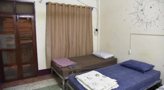 Кровать в общем номере yummy bagpackers hostel