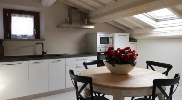 På øverste etage lejlighed Il Borgo di Villa Cellaia