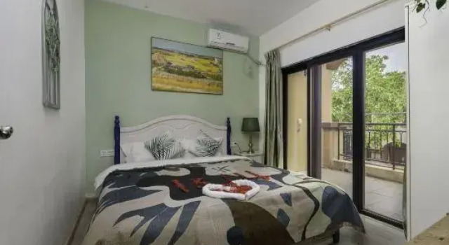 Кровать в общем номере Xiwo·Sakura Theme Hotel (Hezheng Dongfangwan Branch)