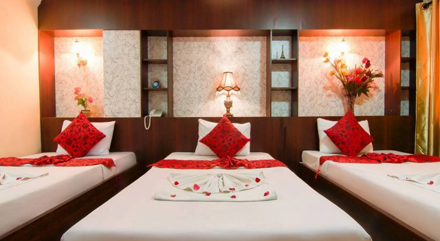Кровать в общем номере Angkor Mithona Guesthouse