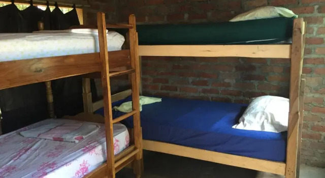 Кровать в общем номере Hostel Los Chocoyos