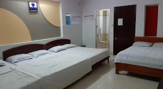 Кровать в общем номере Ngoc Thuan Motel