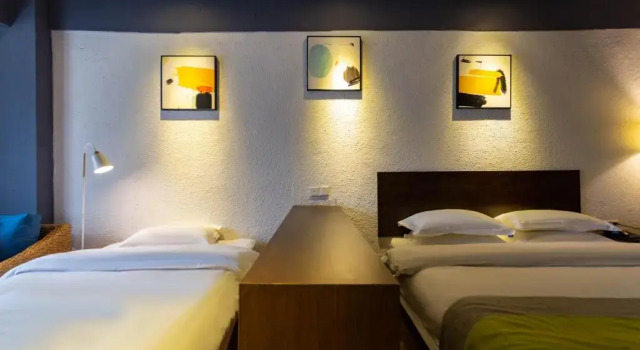 Номер Deluxe Comma Travel International Youth Hotel