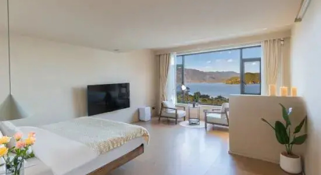 Люкс Дуплекс с 2 комнатами с видом на озеро Lugu Lake Scenic Area Xingye · Yunshanwang Homestay