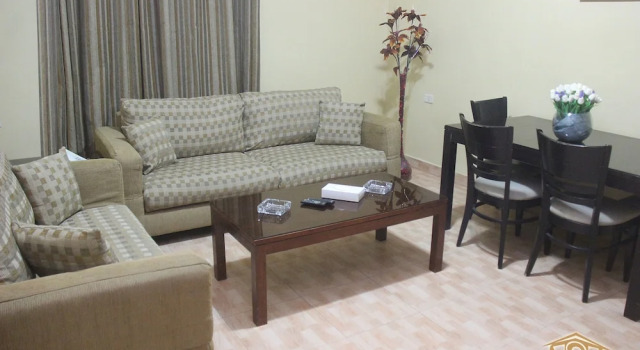 Семейный люкс с балконом Orient House Hotel Suites & Apartments بيت الشرق للشقق الفندقية