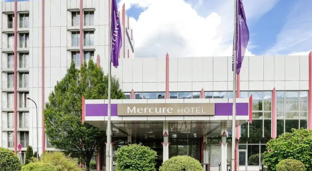 Кровать в общем номере Mercure Stuttgart Sindelfingen an der Messe