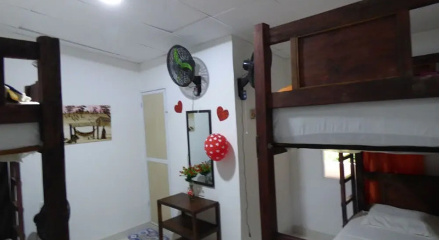 Кровать в общем номере Hostal Alto de la Montaña