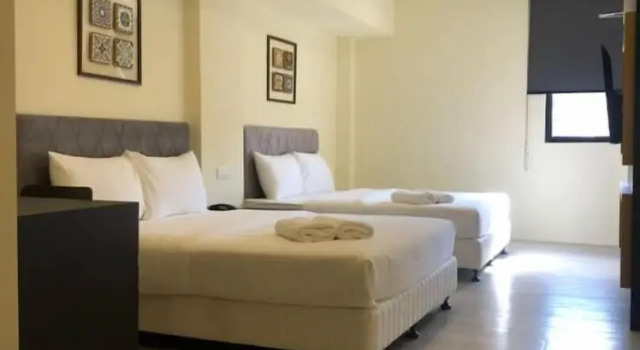 Четырёхместный номер Deluxe Bishop Hotel