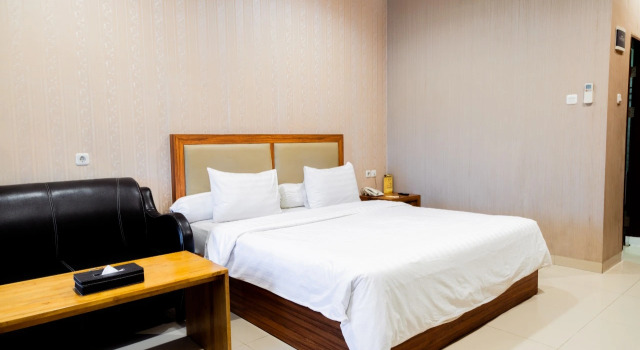 Номер Deluxe Grand Central Medan