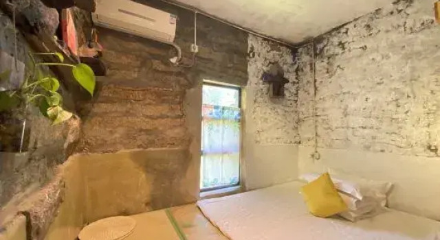 Кровать в общем номере One More Homestay