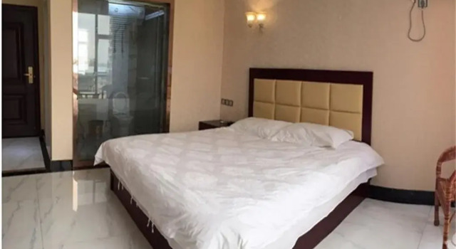 Nantong Suzhong Business Hotel, Rezervovat Hotel Nan-tchung 