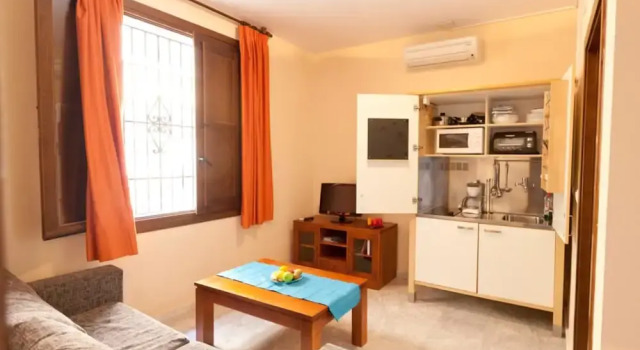 Апартаменты c 1 комнатой Apartamentos Mercader de Sedas