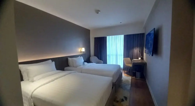 Номер Deluxe Capital O 950 Acqua Novotel Tower