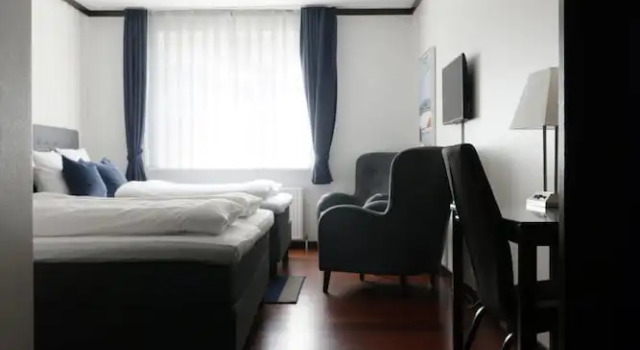 Четырёхместный семейный номер Standard Helnan Phønix Hotel