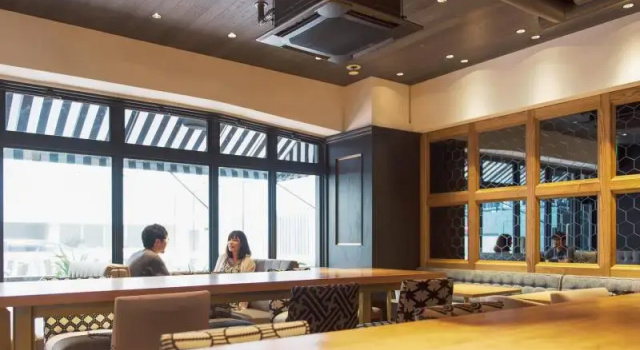 Кровать в общем номере Estinate Hotel Naha