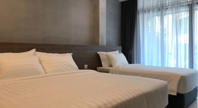 Deluxe triple chambre avec balcon Dandelion Inn