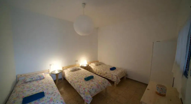 Кровать в общем номере Sol y Mar Surf Camp