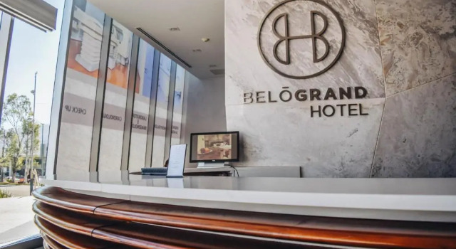 Кровать в общем номере Hotel Belo Grand Morelia